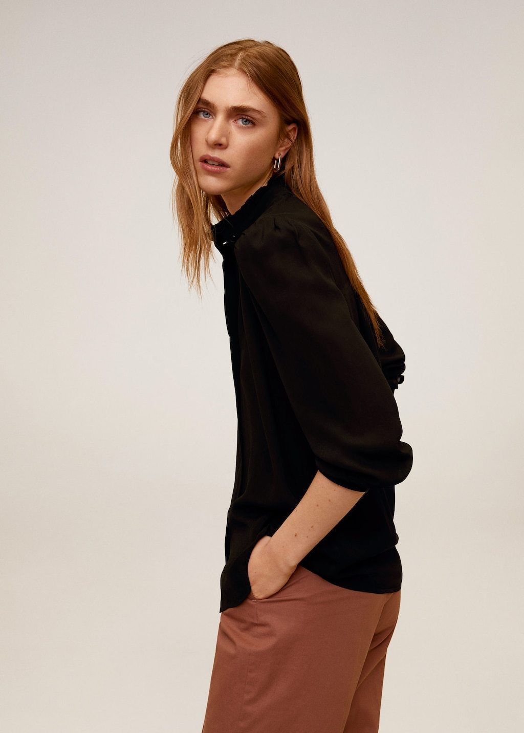 Ruffled neck blouse