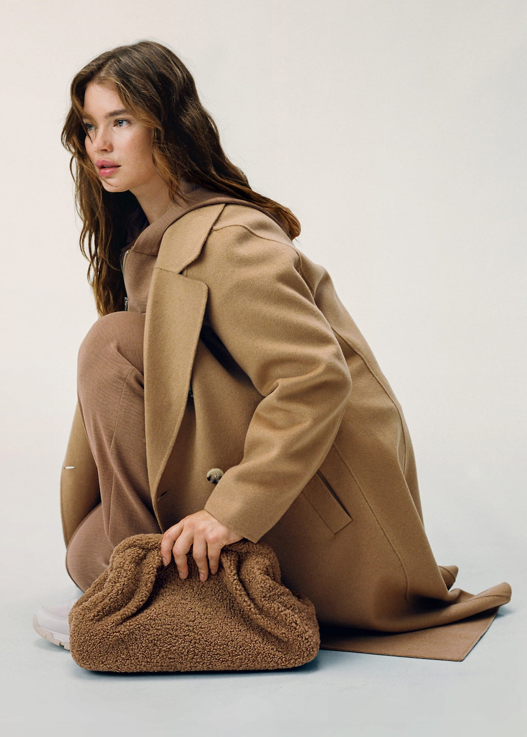 Textured faux-shearling clutch