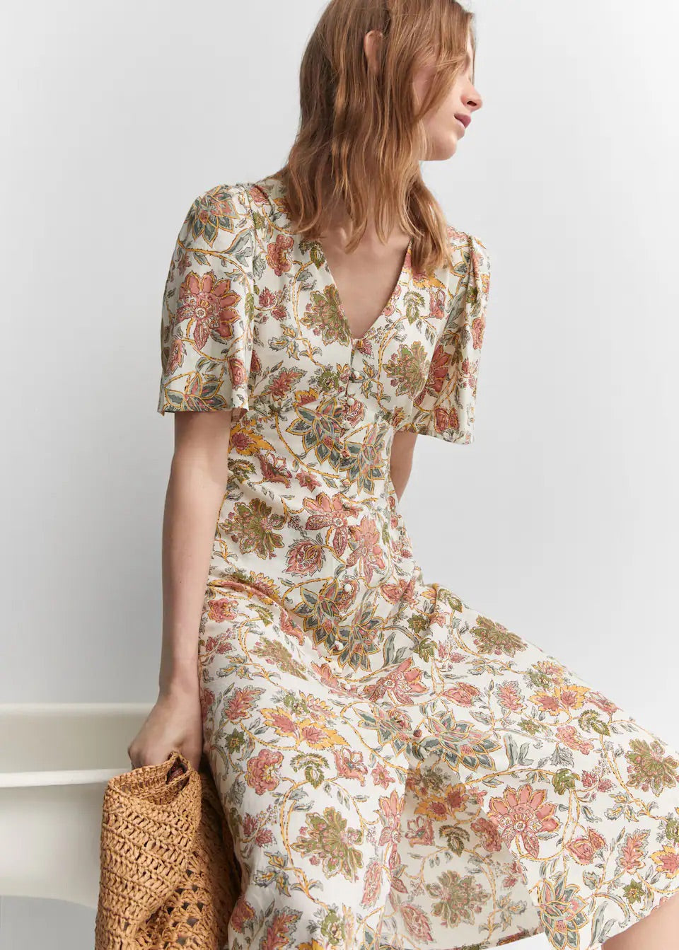 Buttoned linen-blend dress