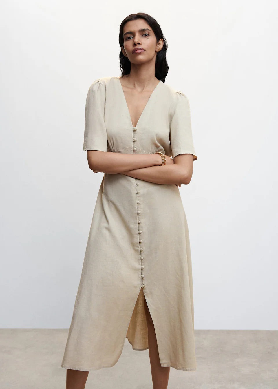 Buttoned linen-blend dress