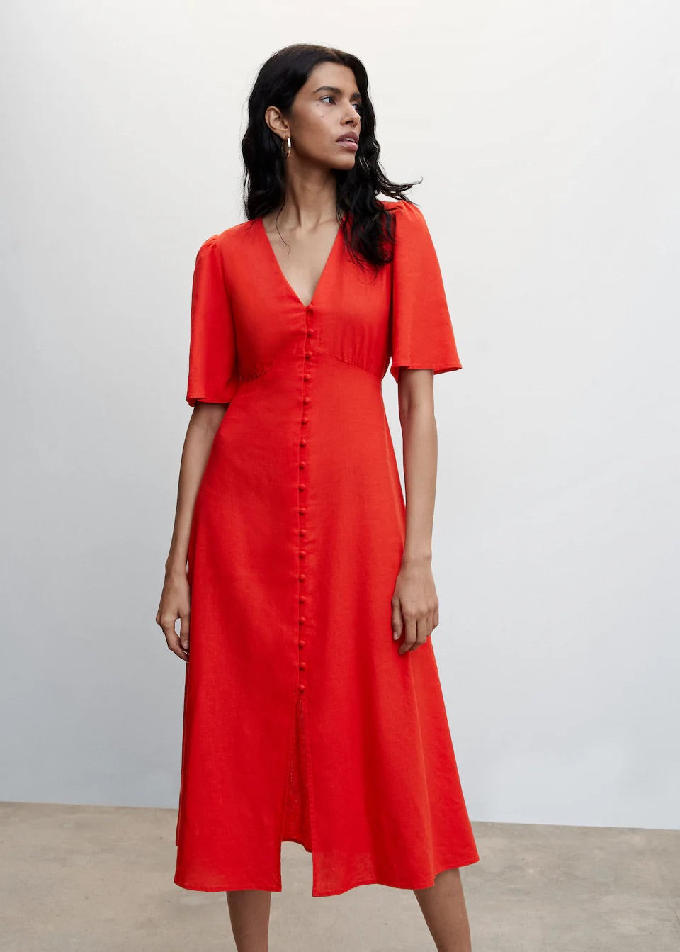 Buttoned linen-blend dress