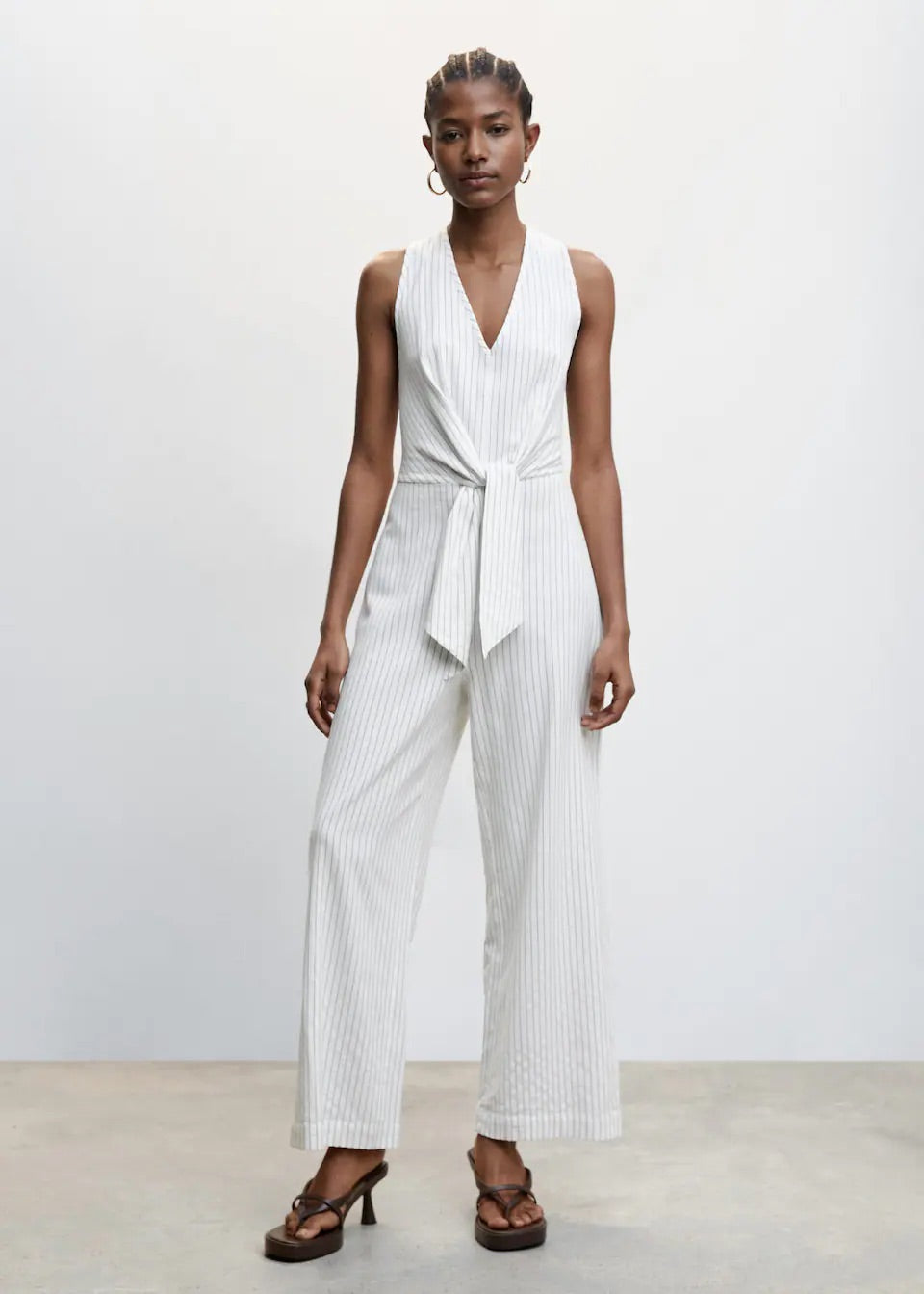 Striped jumpsuit with knot detail