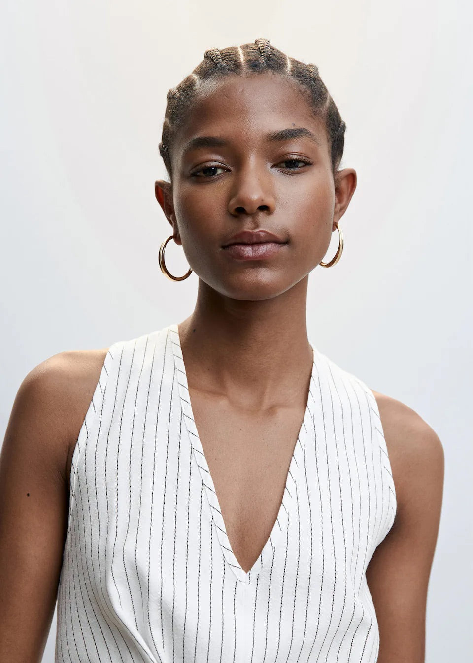 Striped jumpsuit with knot detail