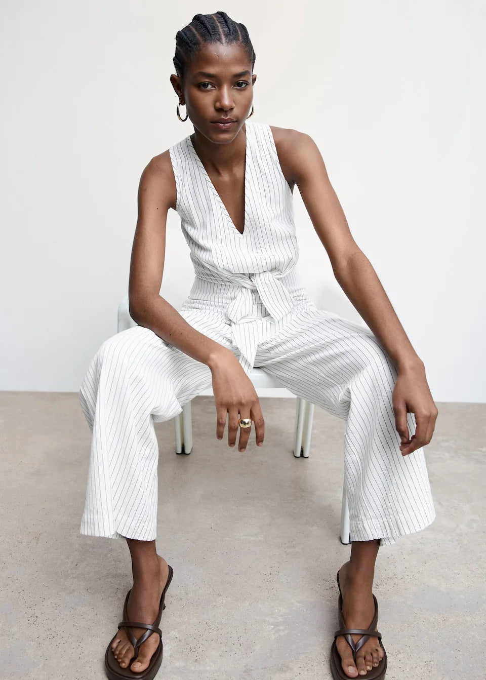 Striped jumpsuit with knot detail