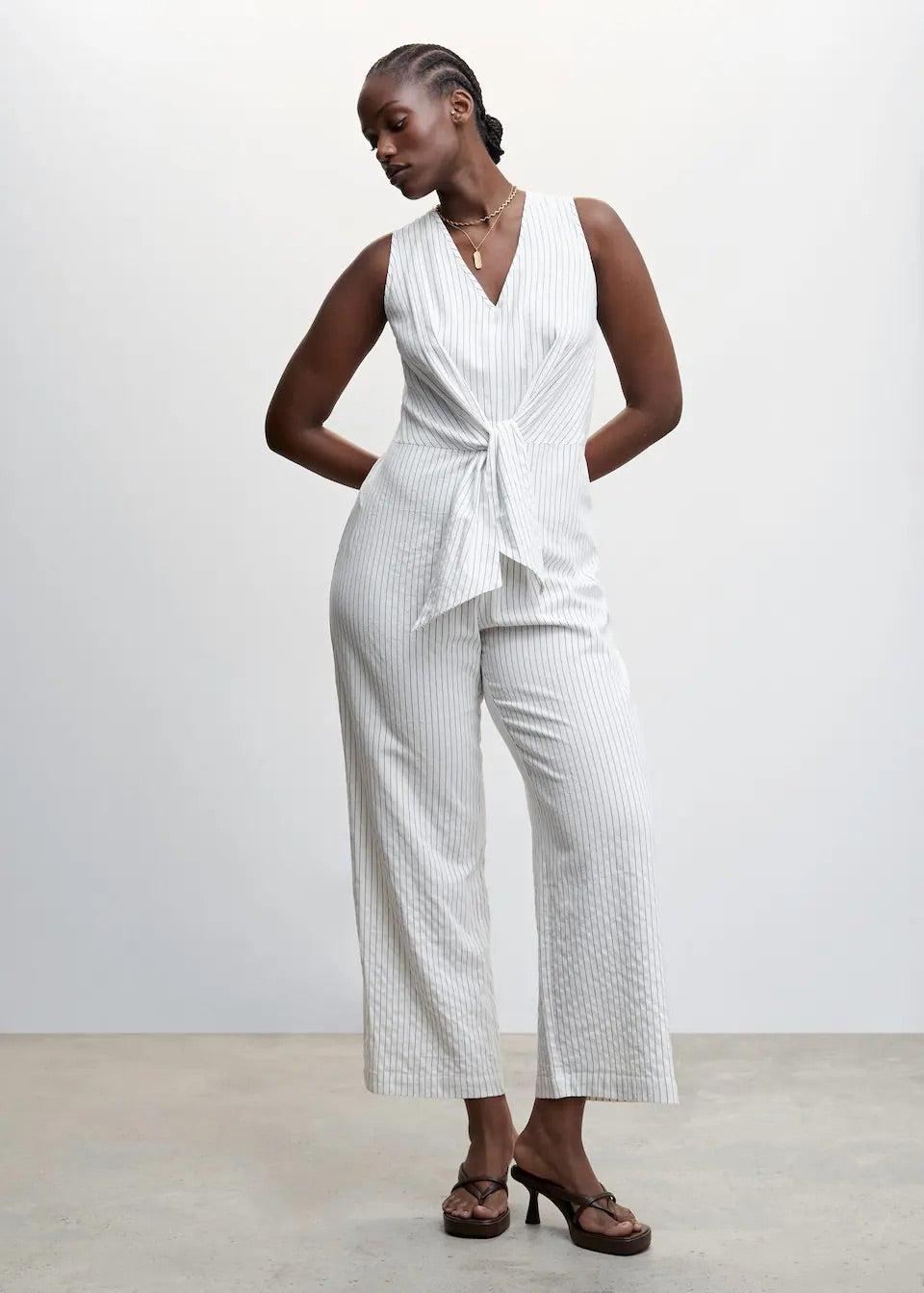 Striped jumpsuit with knot detail