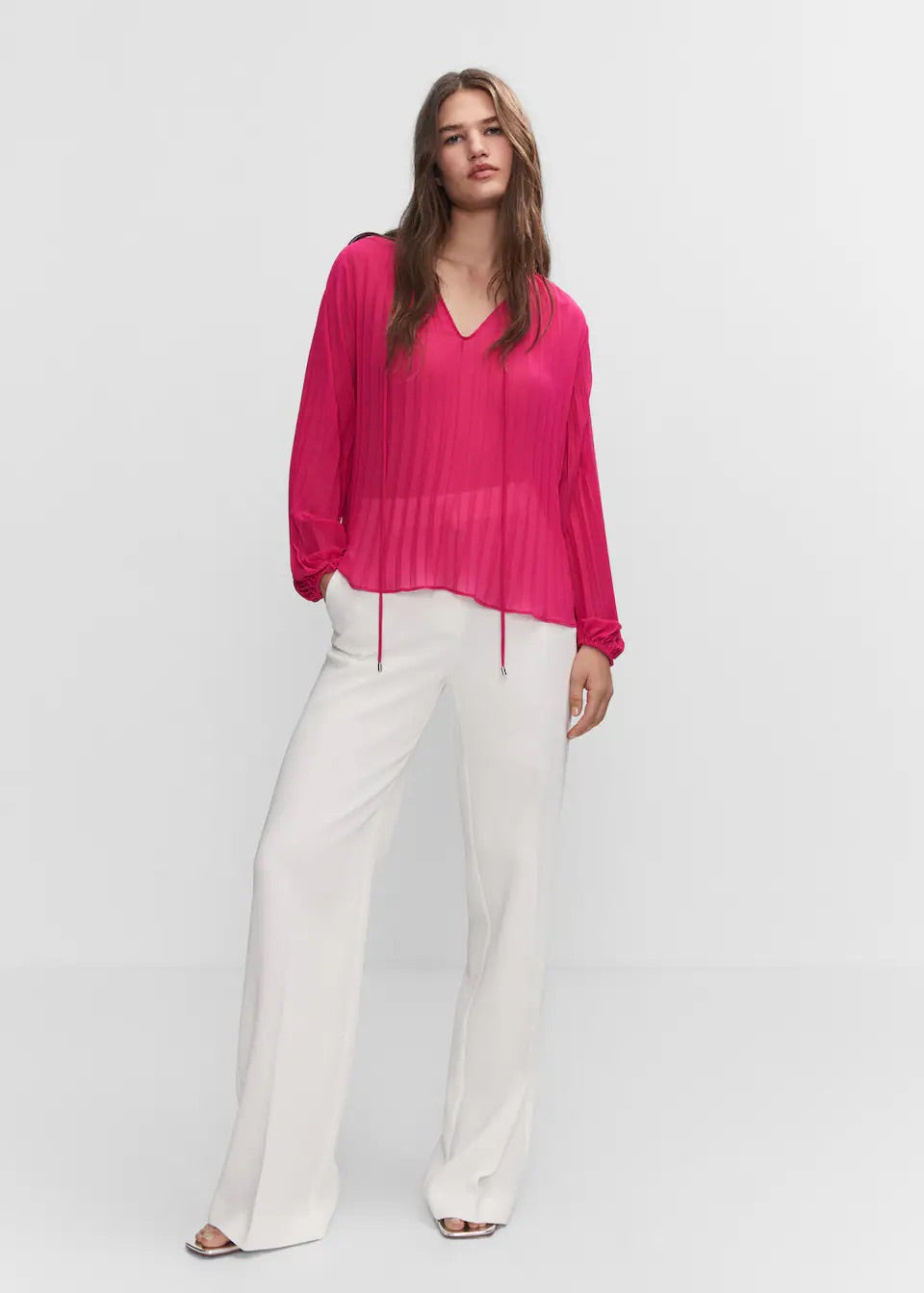 Pleated blouse with puffed sleeves