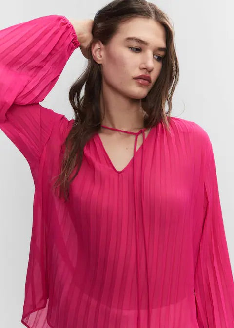Pleated blouse with puffed sleeves
