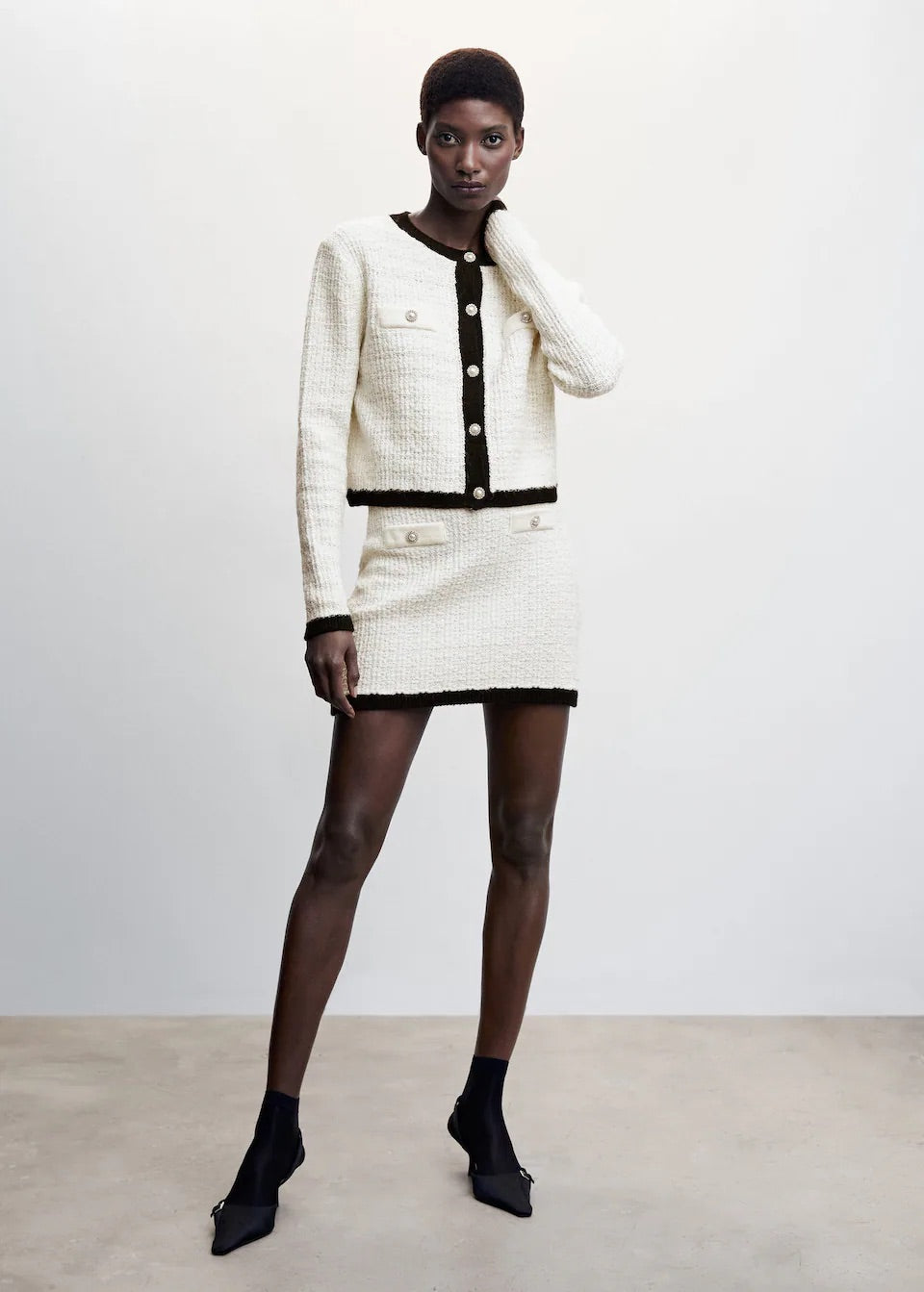 Buttoned tweed skirt