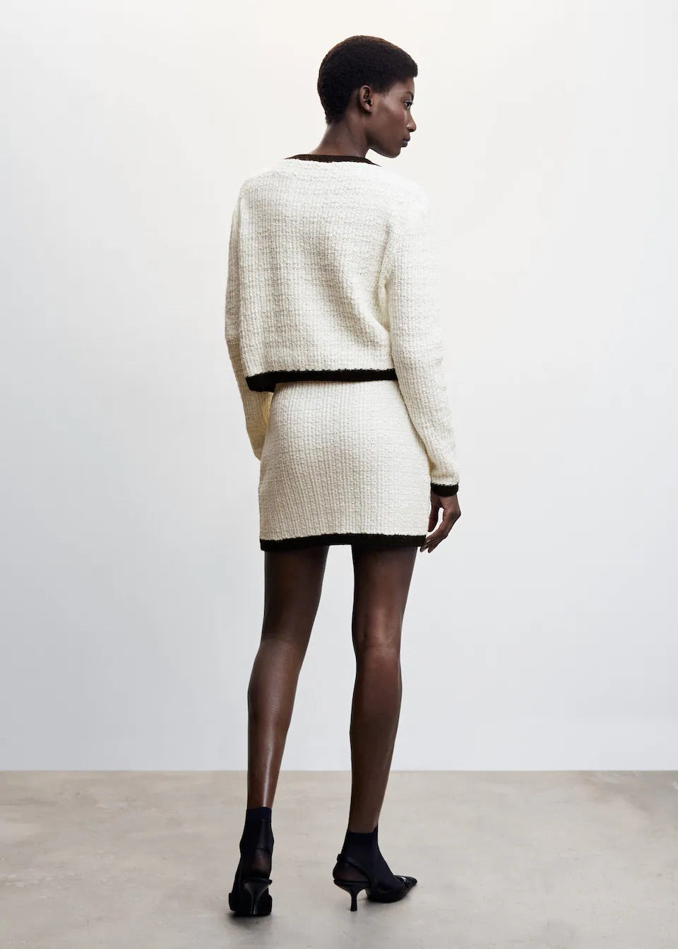 Buttoned tweed skirt