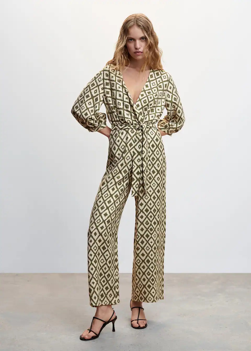 Geometric-print jumpsuit with bow