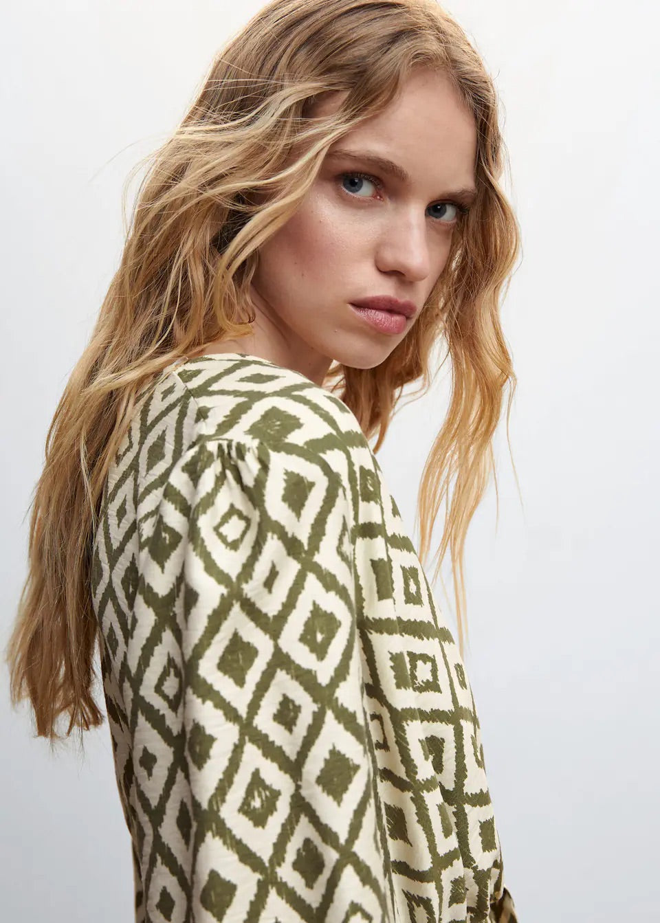 Geometric-print jumpsuit with bow