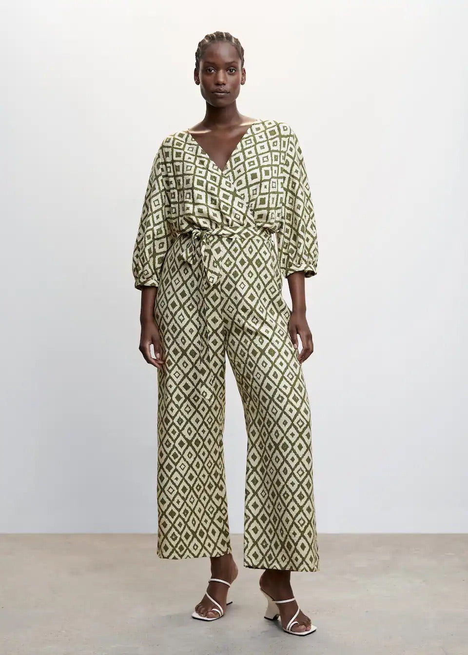Geometric-print jumpsuit with bow