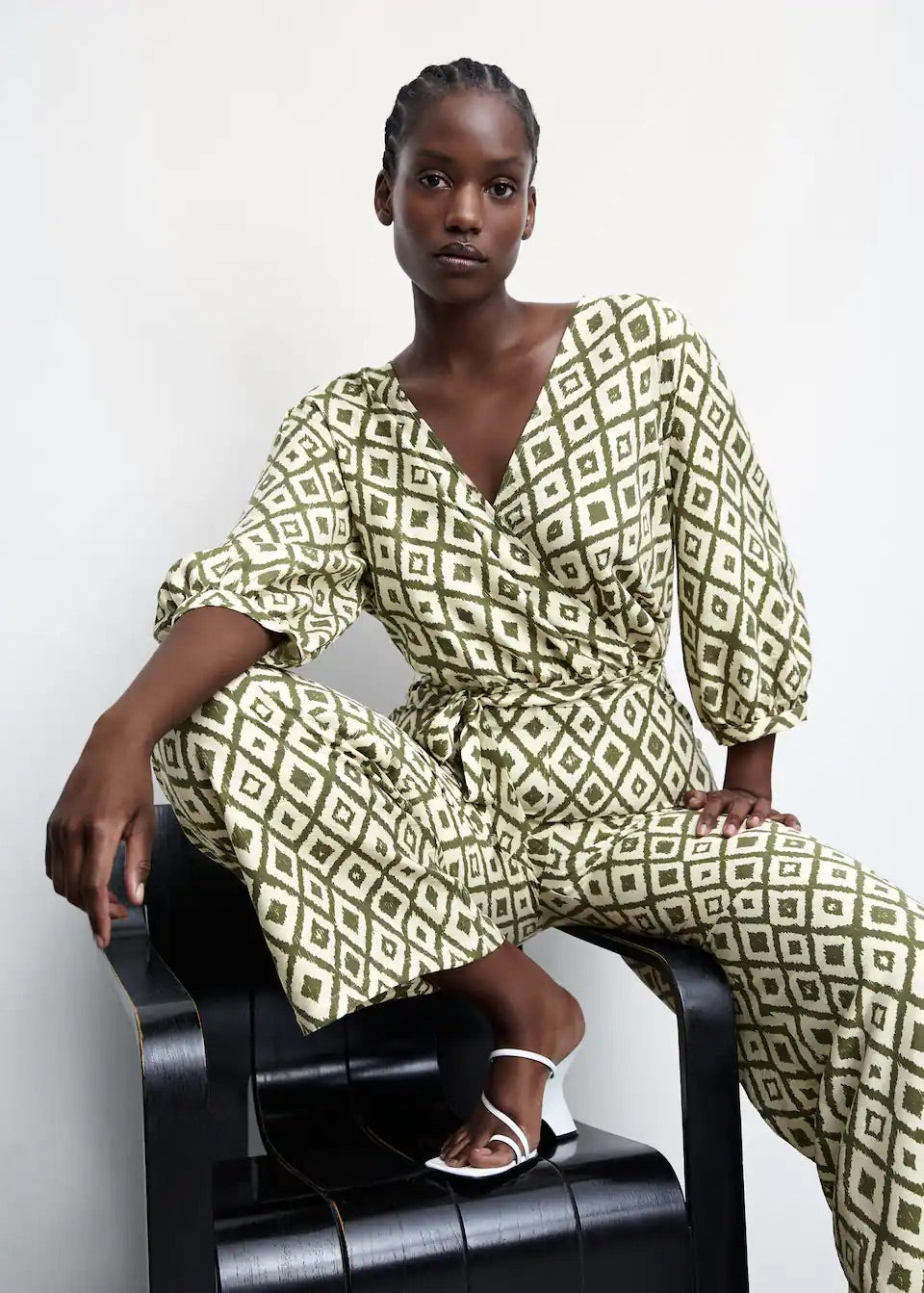 Geometric-print jumpsuit with bow