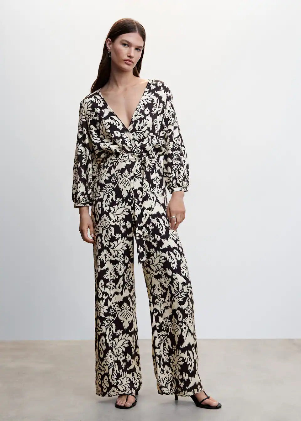 Geometric-print jumpsuit with bow