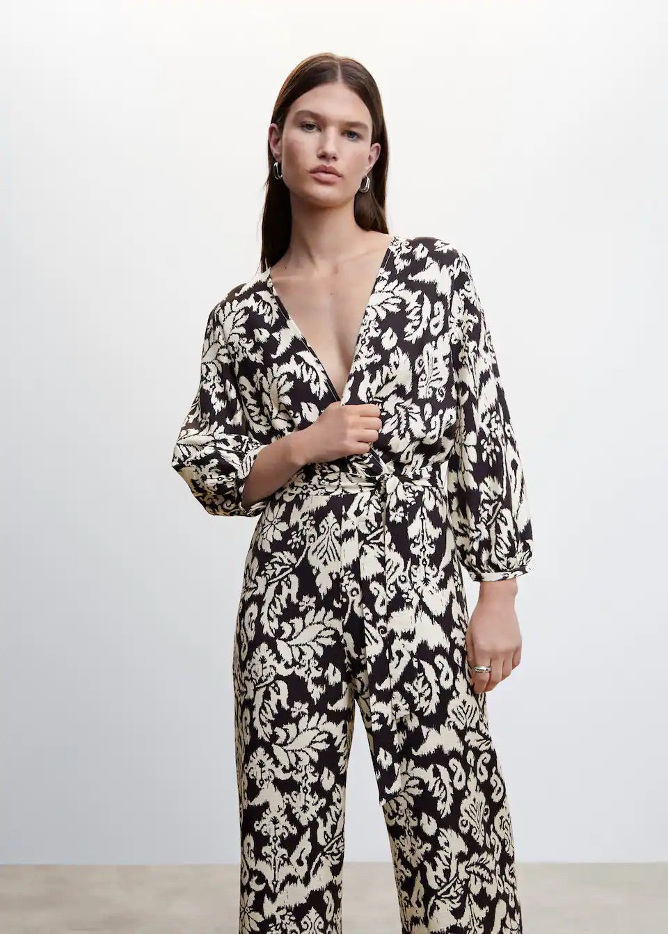 Geometric-print jumpsuit with bow