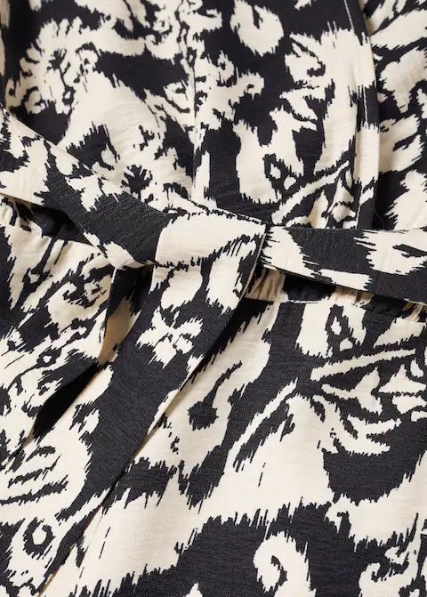 Geometric-print jumpsuit with bow