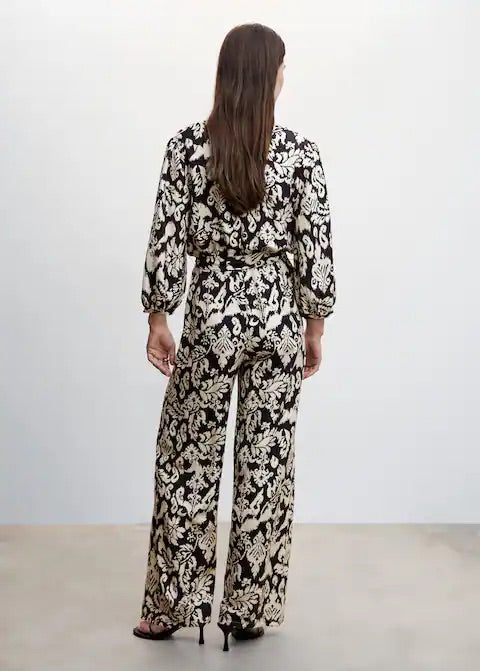 Geometric-print jumpsuit with bow