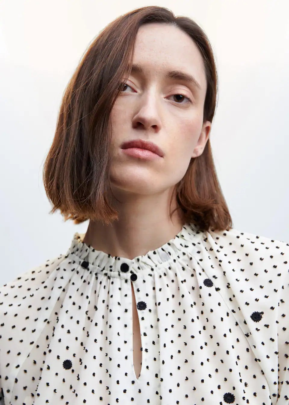 Embroidered polka-dot blouse