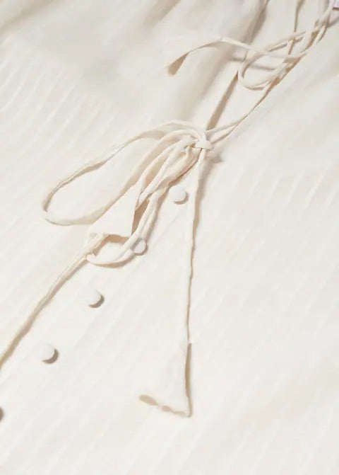 Boho blouse with tassel detail