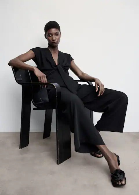 Short-sleeved jumpsuit with knot detail