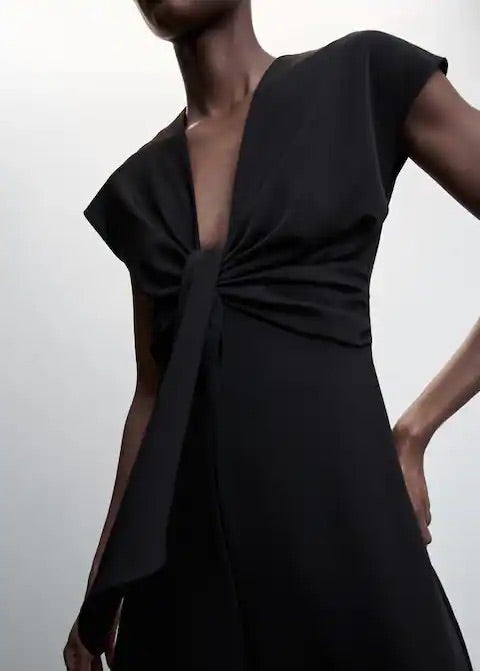 Short-sleeved jumpsuit with knot detail