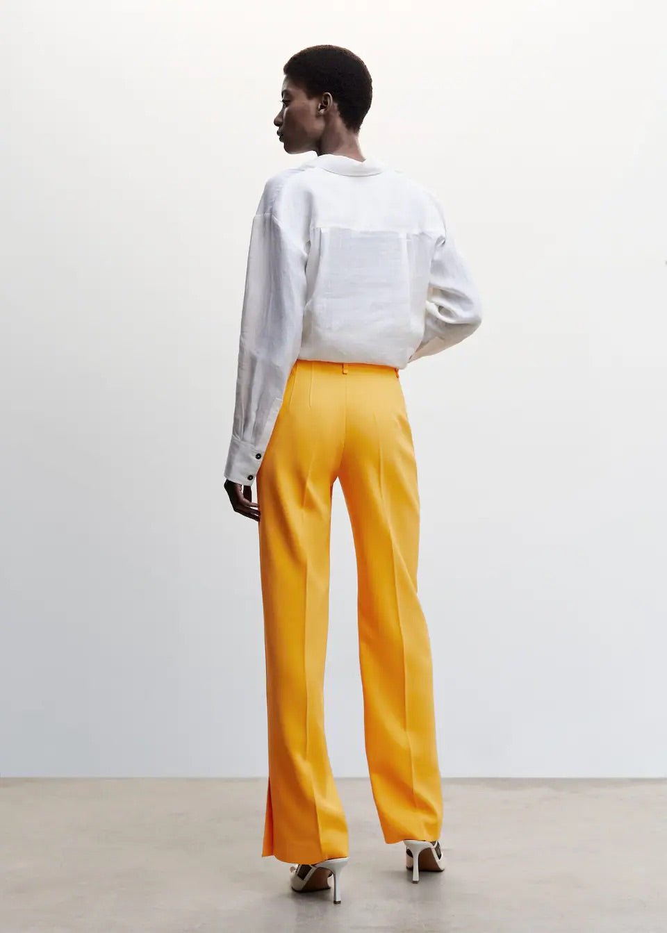Straight trousers with openings