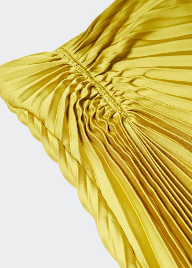 Pleated asymmetric skirt