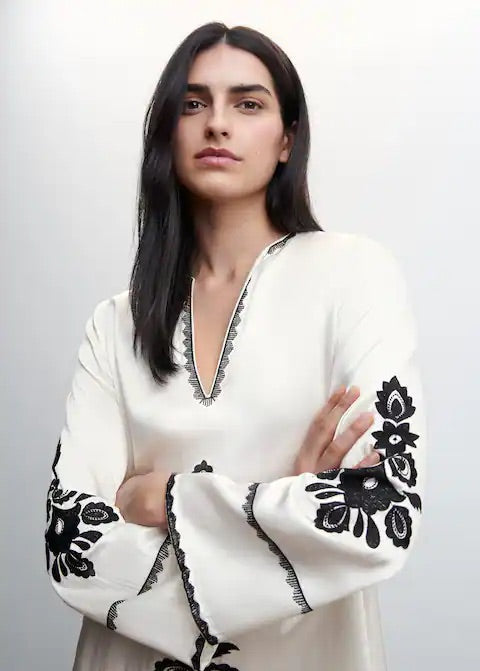 Embroidered dress with side slit