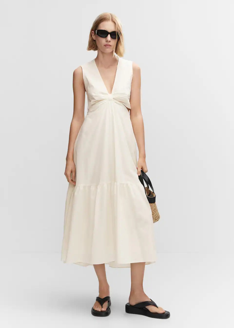 Knot dress with openings