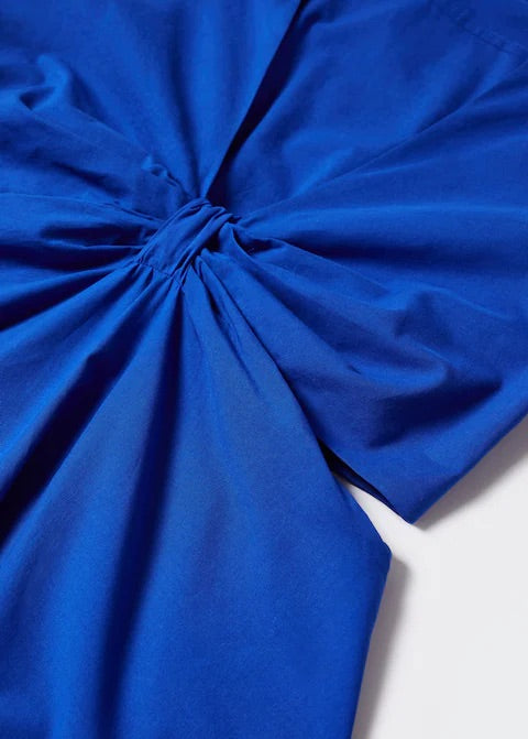 Knot dress with openings