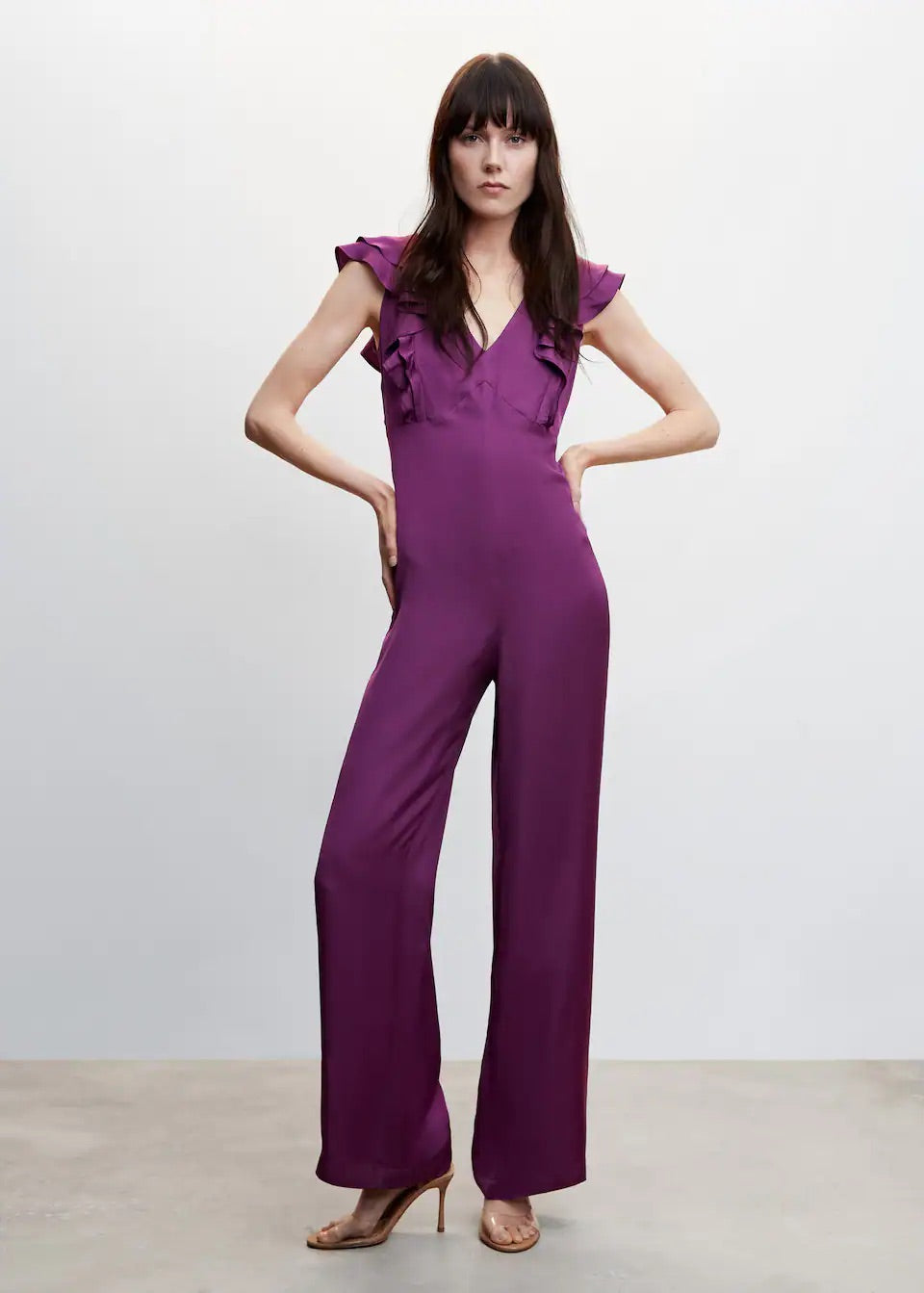 Ruffled jumpsuit with open back