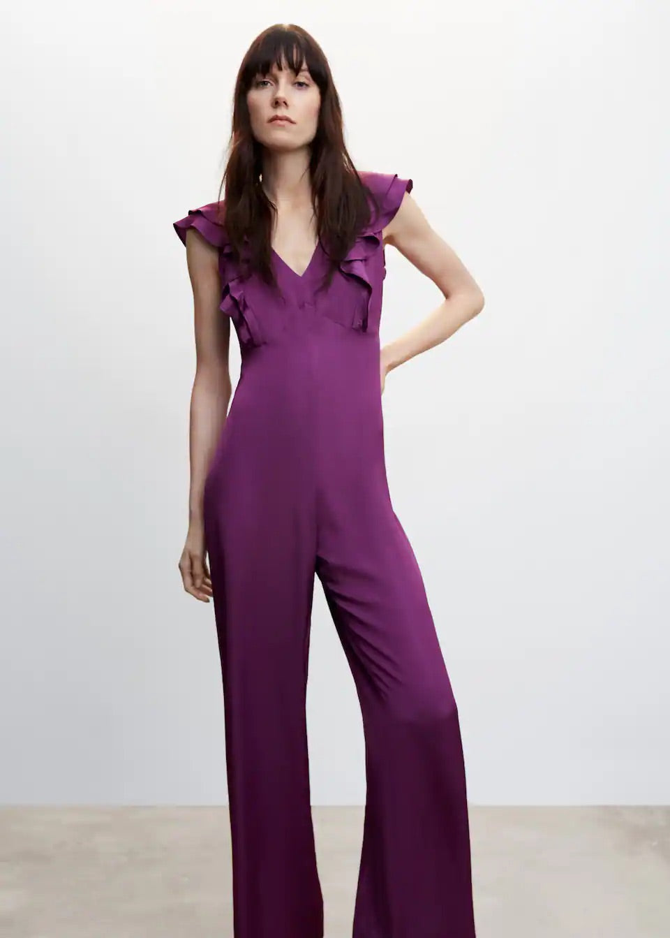 Ruffled jumpsuit with open back