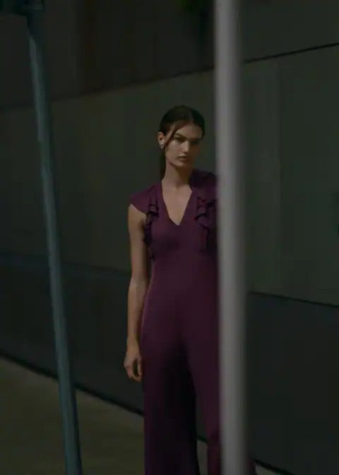 Ruffled jumpsuit with open back