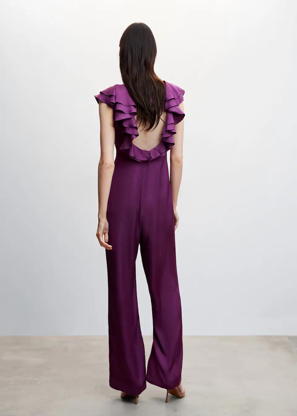 Ruffled jumpsuit with open back