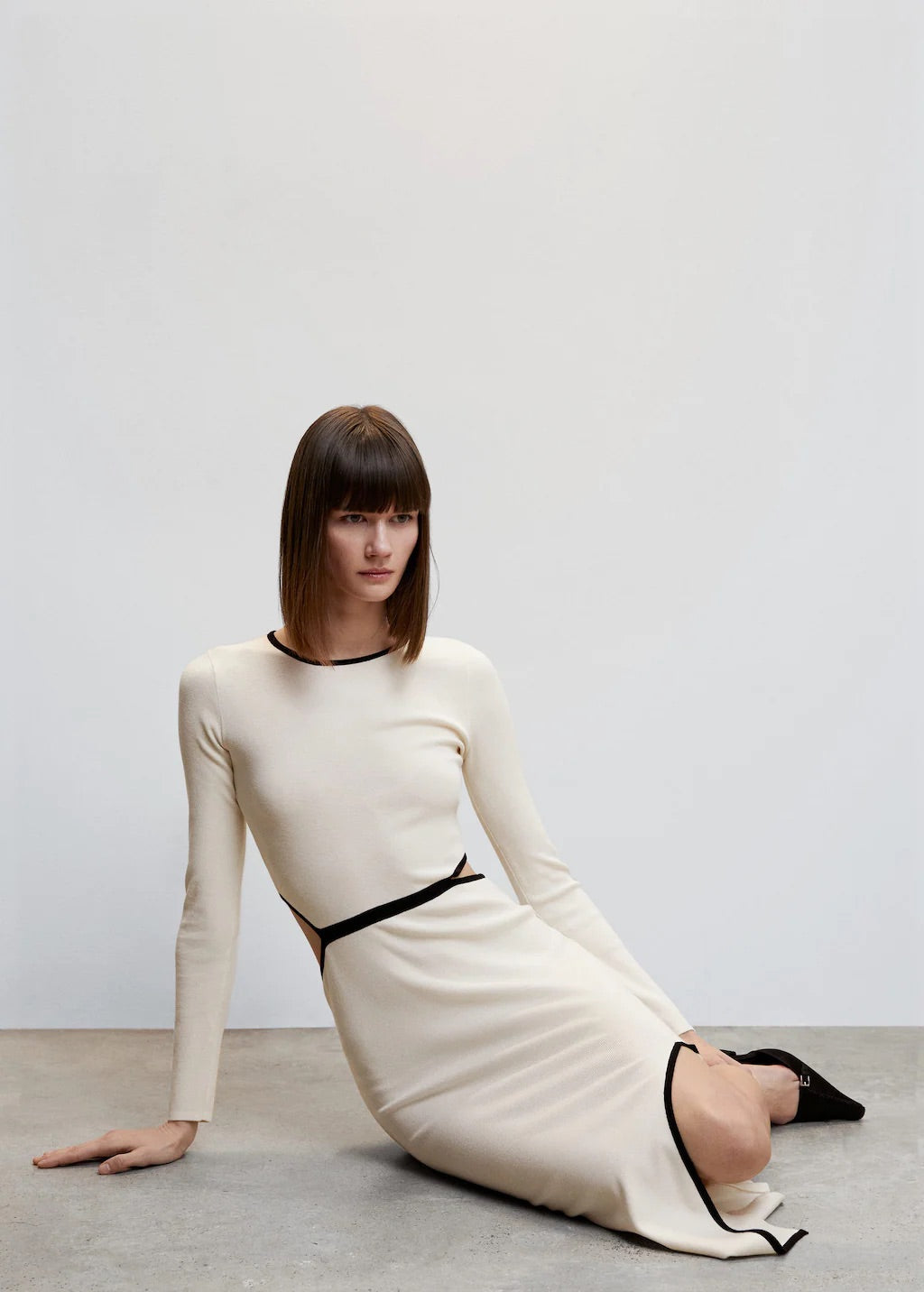Knitted dress with openings