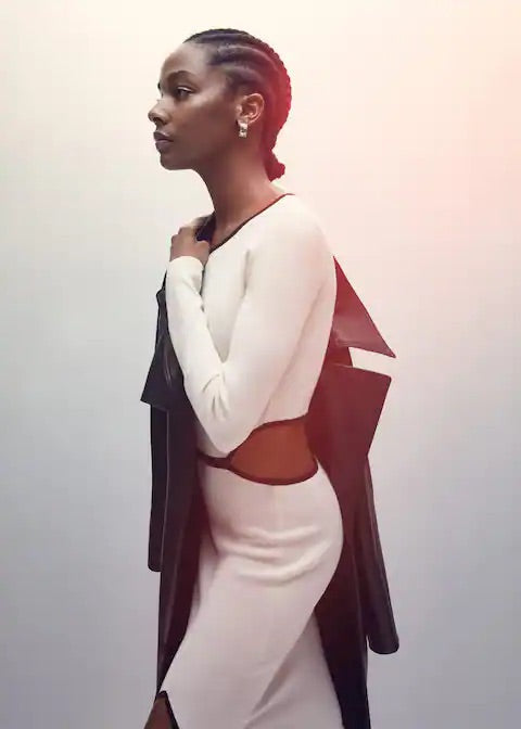 Knitted dress with openings