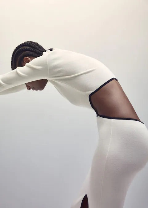 Knitted dress with openings