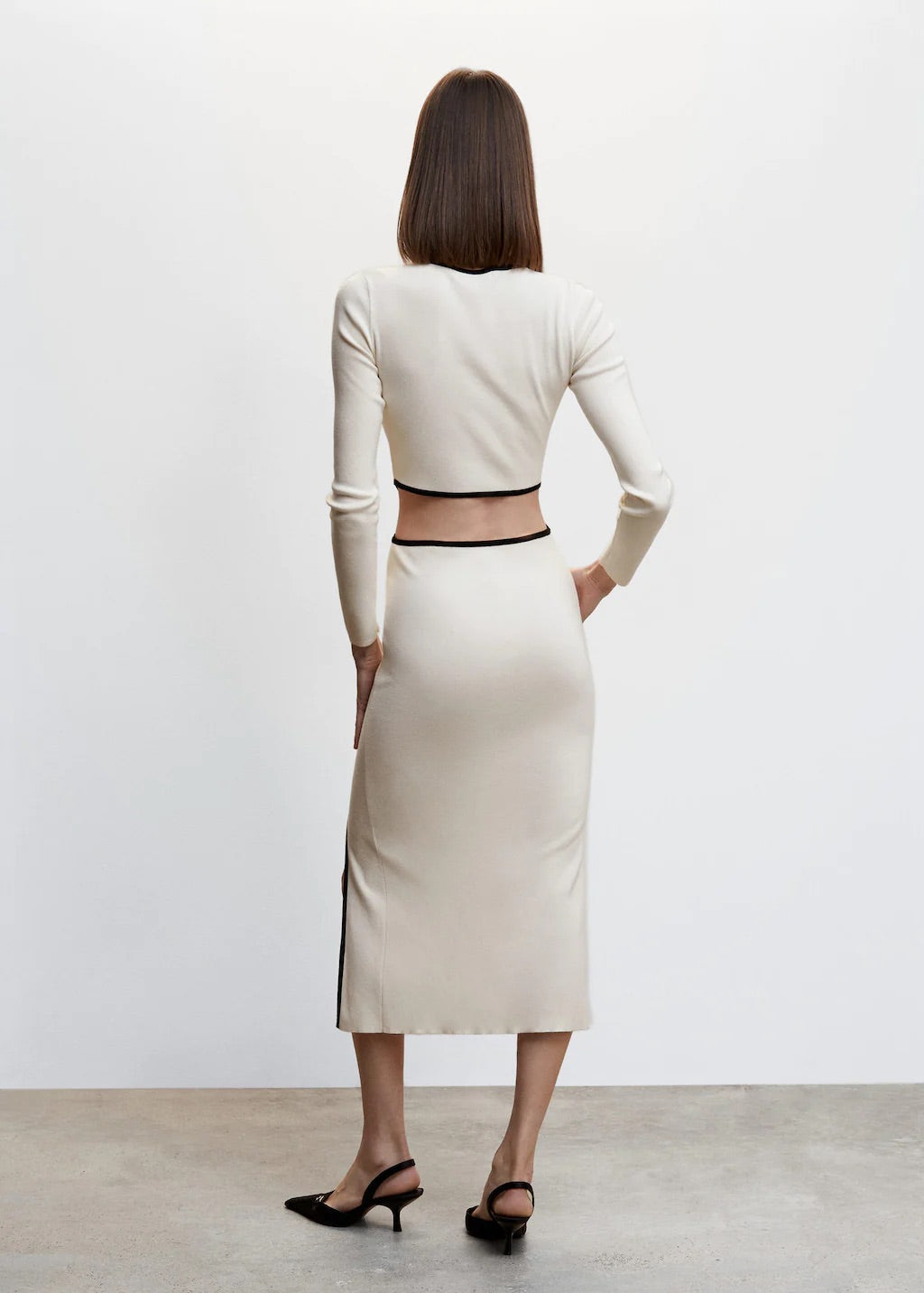 Knitted dress with openings