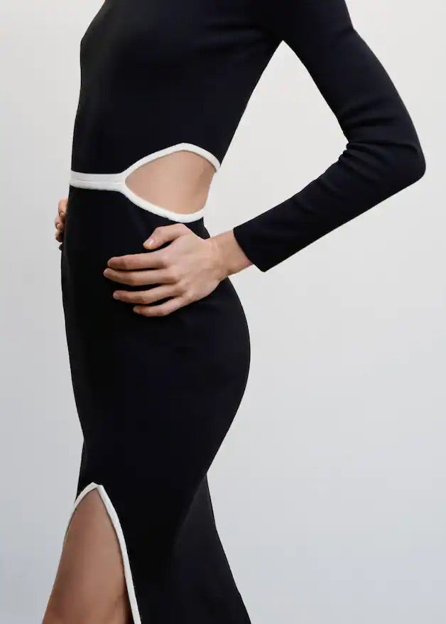 Knitted dress with openings