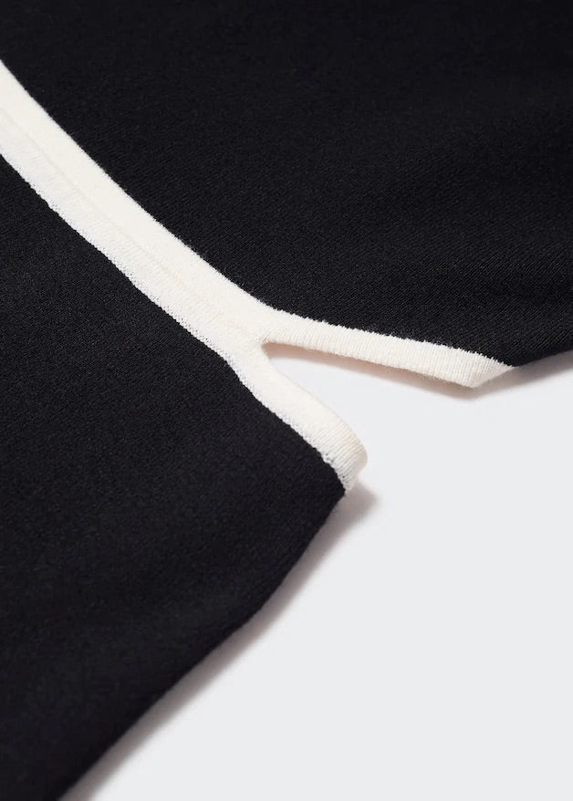 Knitted dress with openings