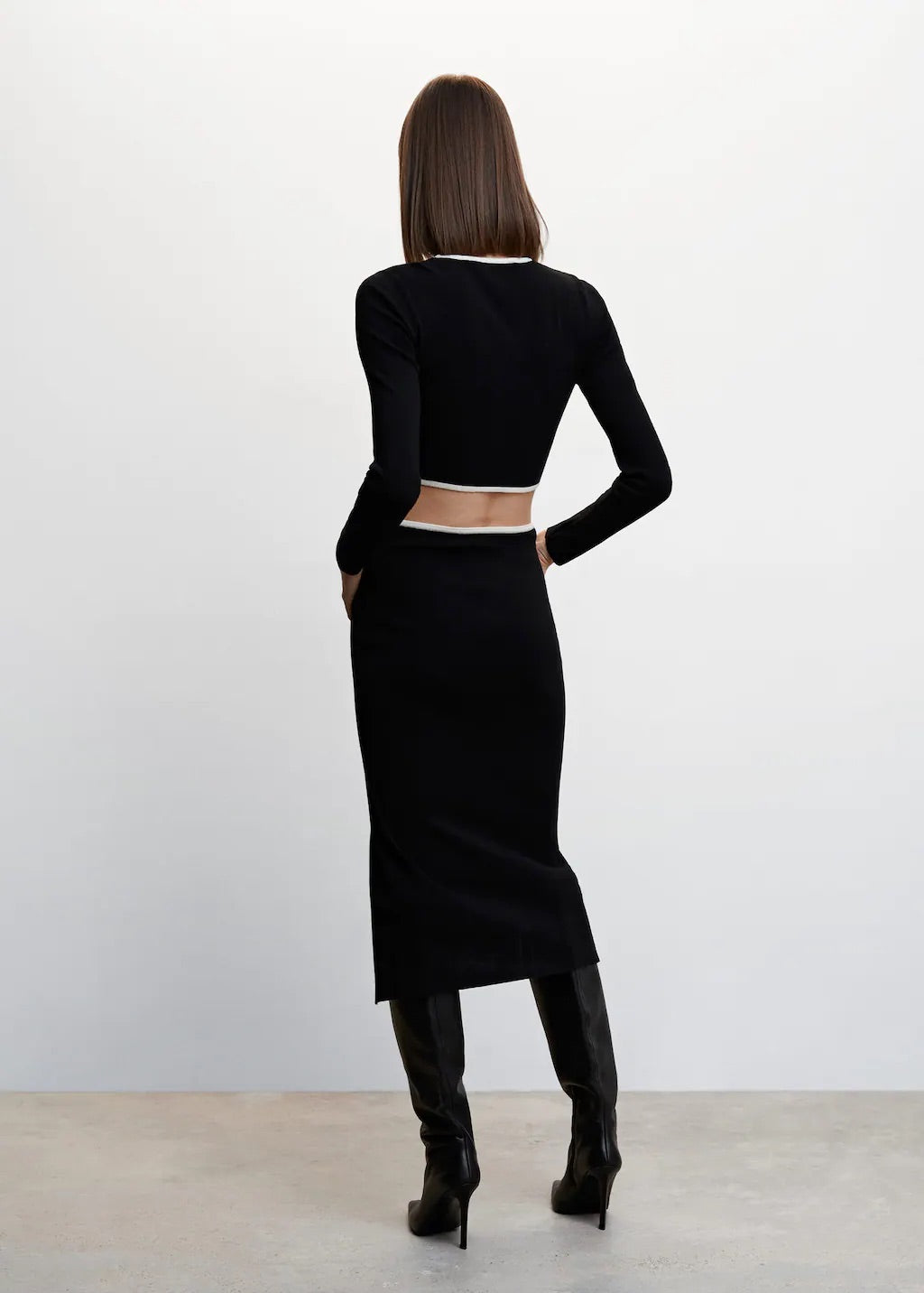 Knitted dress with openings