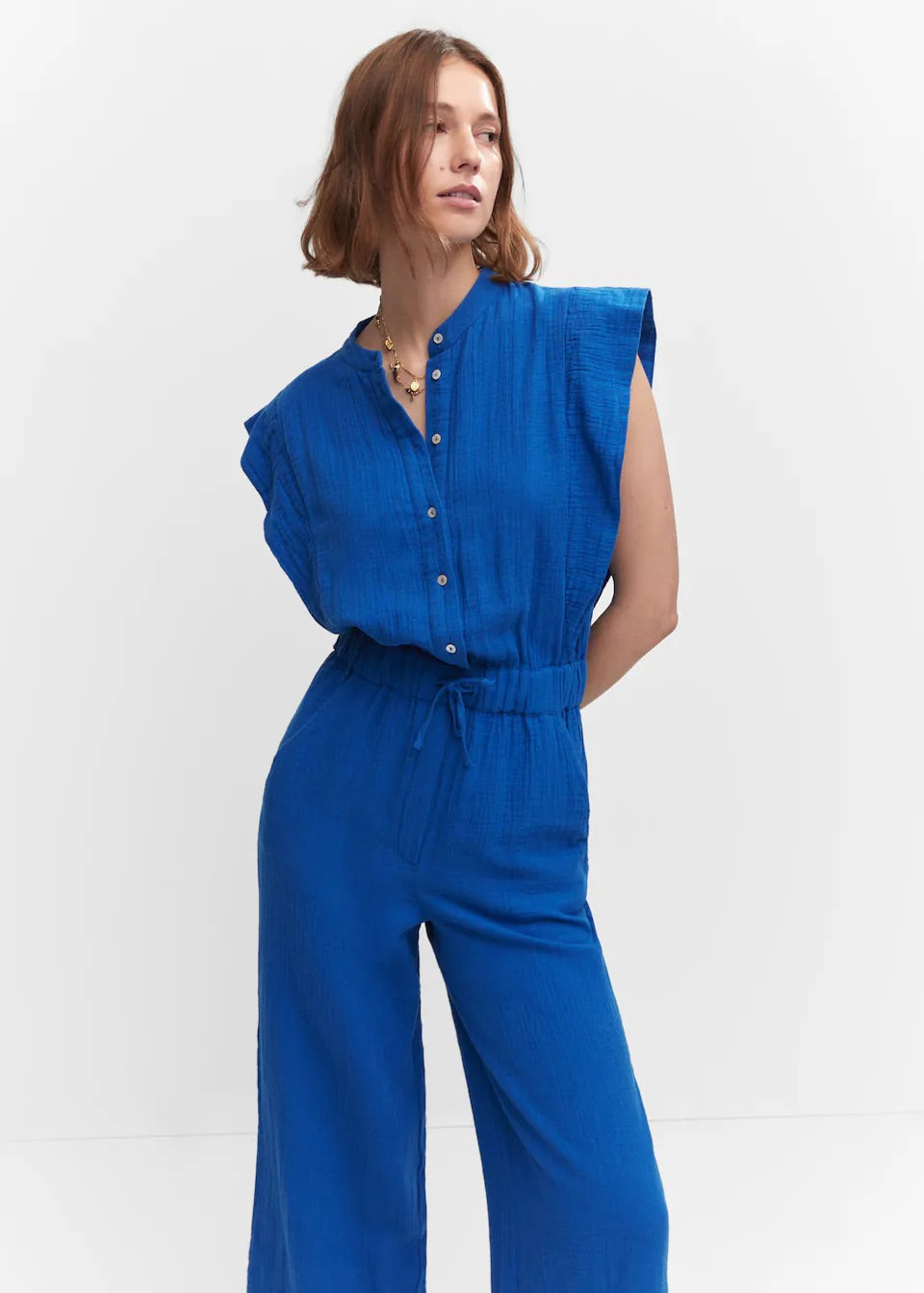 Textured jumpsuit with button