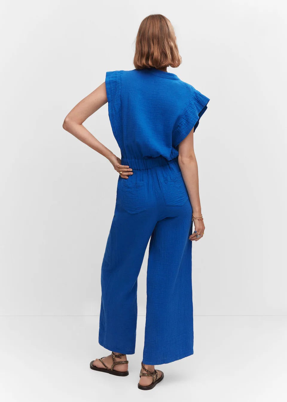 Textured jumpsuit with button