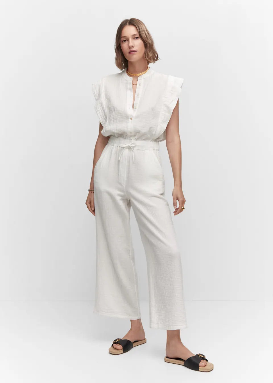Textured jumpsuit with button