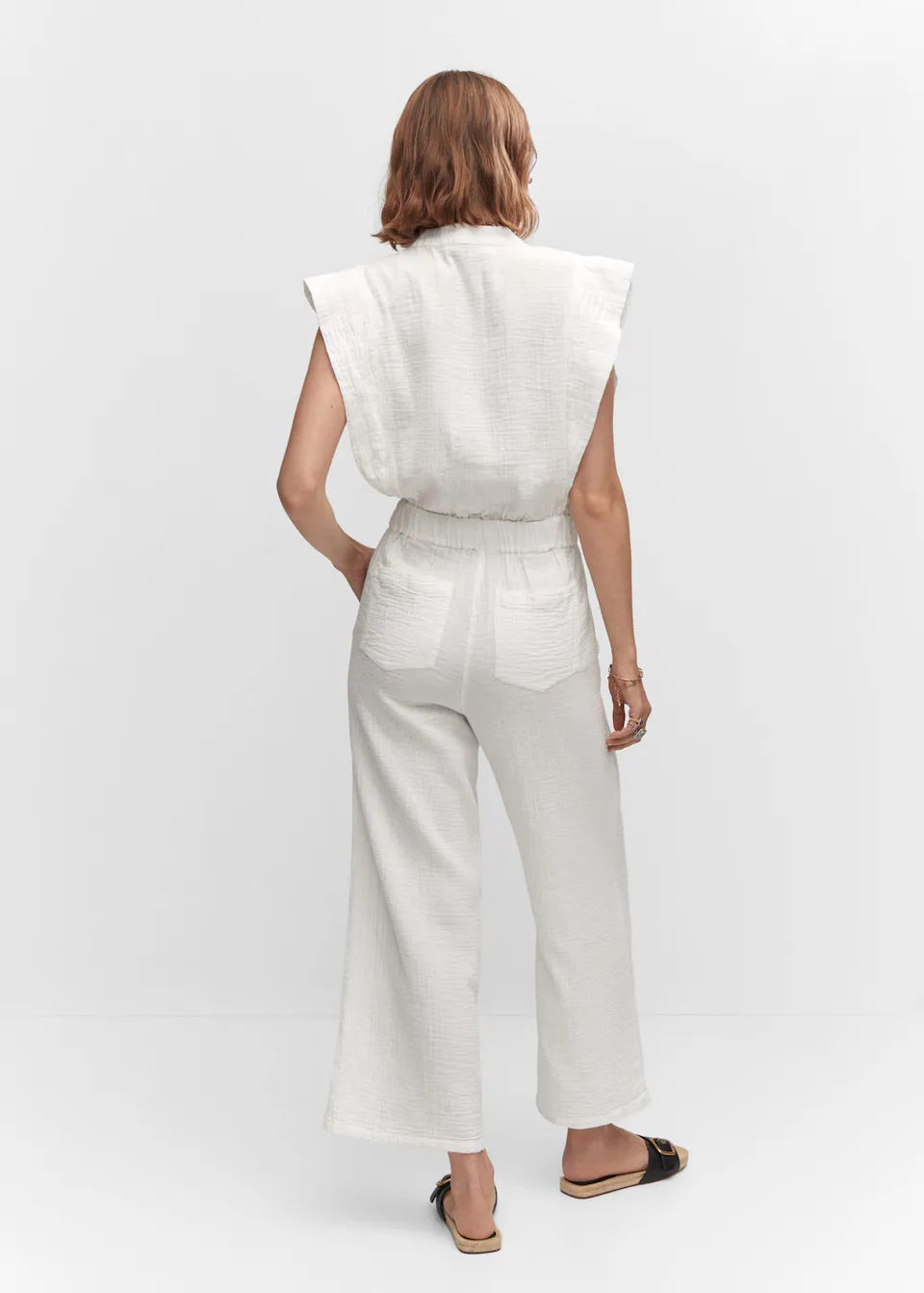 Textured jumpsuit with button