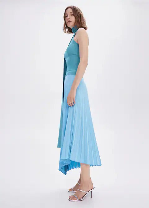 Pleated asymmetric skirt