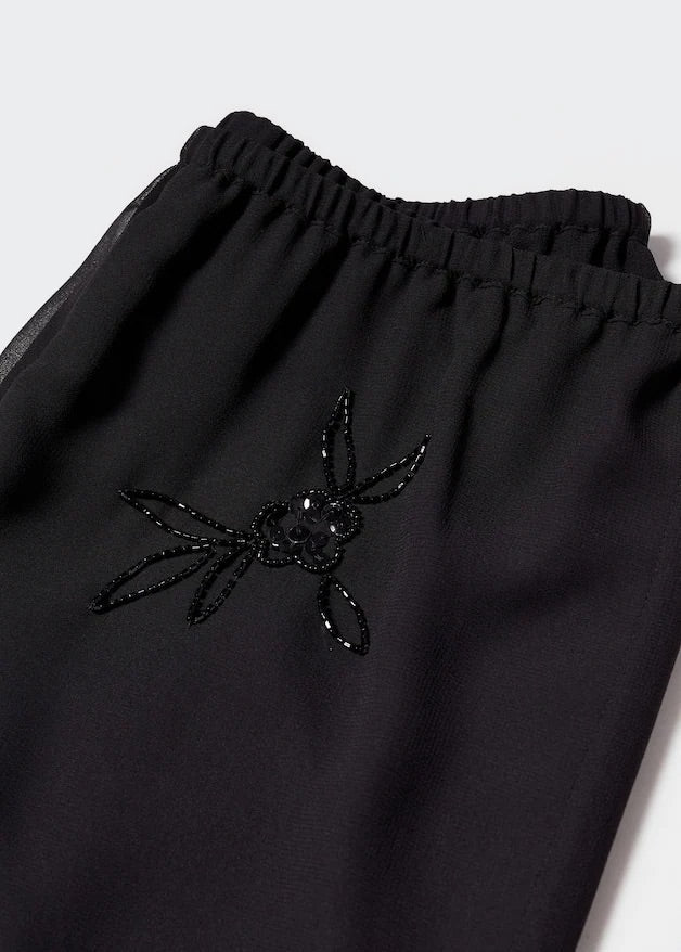 Pants with bead detail