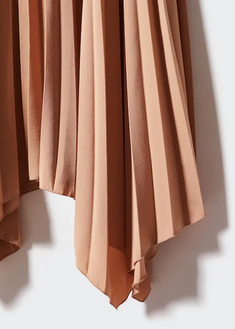 Pleated asymmetric skirt