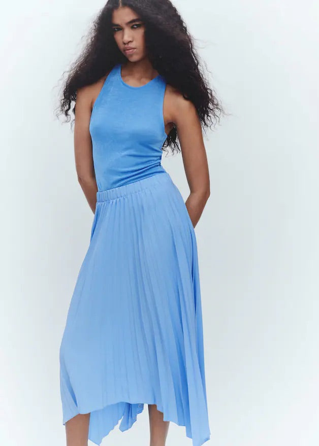 Pleated asymmetric skirt