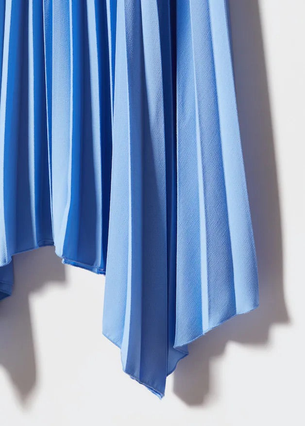 Pleated asymmetric skirt